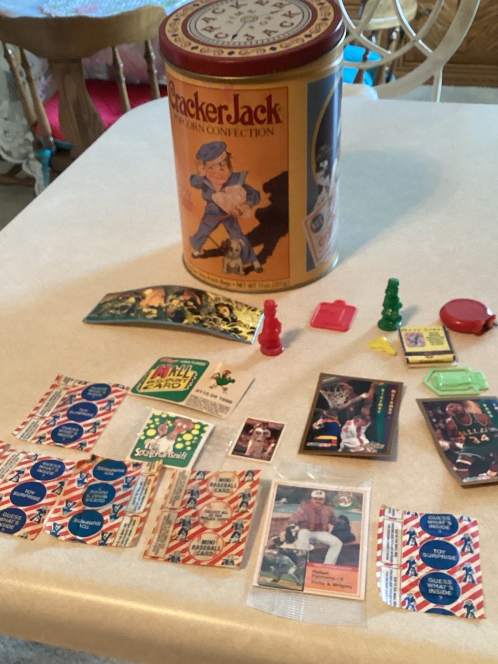 Collectible Tin with Yellow Vintage Game Pieces, Cracker Jack